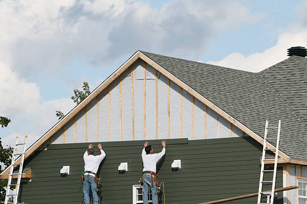 Professional Storm Damage Siding Repair technician working in Milford Center, OH